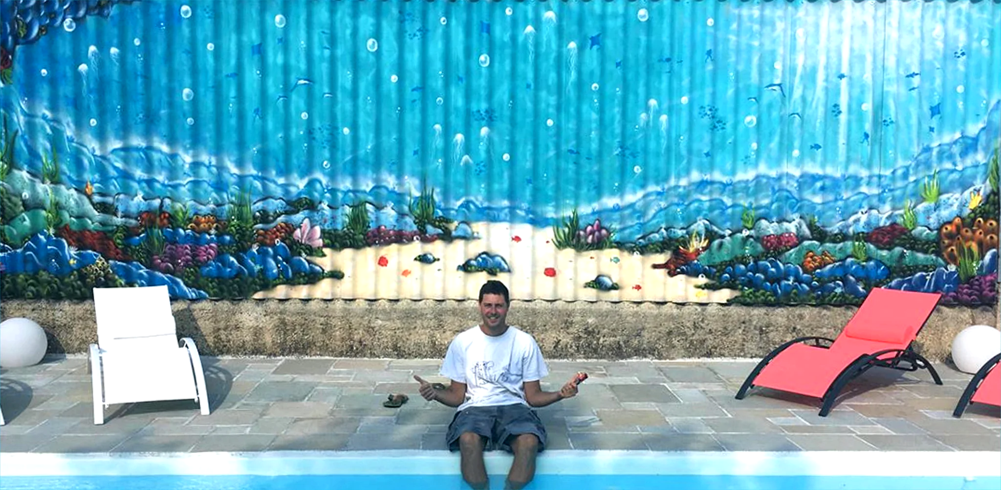 Fresque piscine avec décor sous-marin
